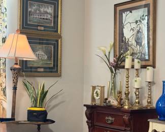 Framed artwork, brass candlesticks, decor