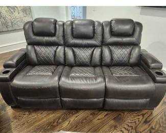 These are new quilted leather sofas from star power. beautiful chocolate, Brown