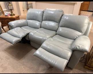 Beautiful, beautiful sky, blue leather reclining sofa