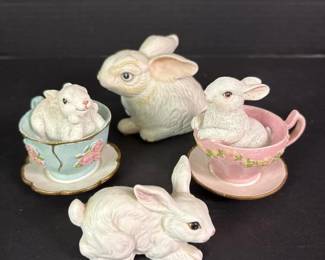 179 fourporcelainbunnyfigurinesinteacup