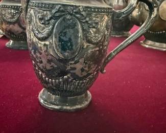 Rare! 19th Century SCHENKEL Coin Silver (90% Silver) Coffee/Tea Set featuring Gorgeous High-end Hand-chased Repousse' work. Pieces include Coffee Pot, Teapot, Creamer and Sugar