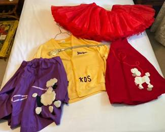 Two Vintage Poodle Skirts with Red Petticoat Yellow Varsity Sweater and Heart Belt
