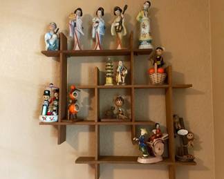 Japanese Dolls and Figurines on Display Shelf
