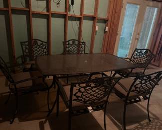 Two patio sets with table,6 chairs and umbrella 