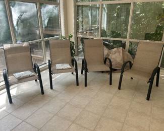 4 patio chairs and covers for each. 2 covers never opened 