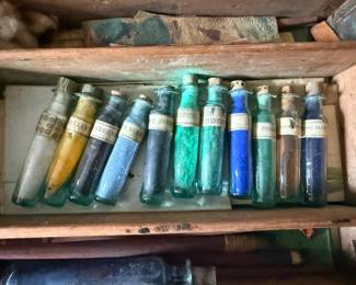 Original bottles filled with color pigment powder