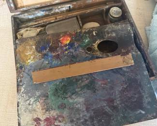 with original paint bottles and brushes