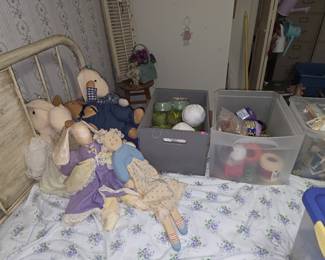 Bed with dolls