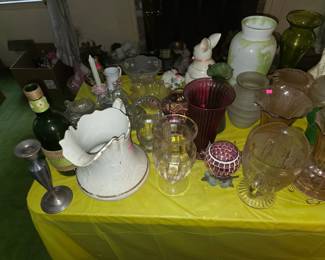 Vases and other glassware. There is heavy crystal glassware here as well.