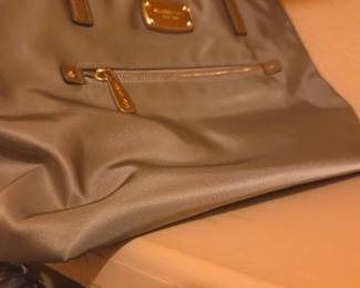 WWhy I took a picture of a purse is beyond me,  If she has one, she has 73.5