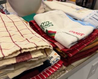 Assorted Vintage and Contemporary Kitchen Linens with Holiday and Checked Patterns