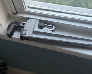 Lot 37: Monkey Wrench with Unused Plumbers Putty