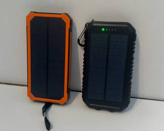 Lot 43: Two Portable Solar Powered Energy Banks