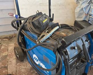 Miller Syncrowave 180 SD TIG/Stick welder with torch, ground clamp, leads/cables and rolling cart. Serious shop equipment for welders, fabricators and metalworkers — sold as found. Come inspect it and make an offer!
