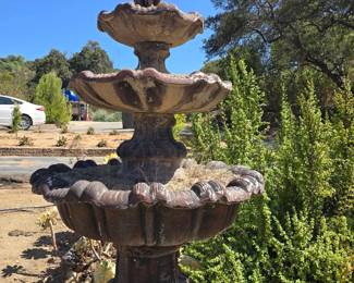 MONUMENTAL 3-TIER CAST STONE GARDEN FOUNTAIN Ornate scalloped basins with classical figural finial. Beautiful aged garden patina. Buyer responsible for disassembly, loading & removal.