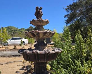 MONUMENTAL 3-TIER CAST STONE GARDEN FOUNTAIN Ornate scalloped basins with classical figural finial. Beautiful aged garden patina. Buyer responsible for disassembly, loading & removal.