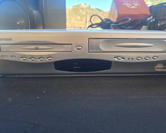 Emerson DVD/VCR combo player — DVD, CD/MP3 and 4-head VHS in one unit. Great retro electronics find for VHS collectors, old home movies or a vintage media setup. Untested and sold as found.