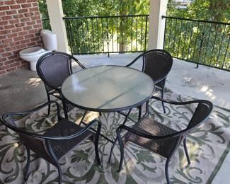 Exterior glass top table and chairs