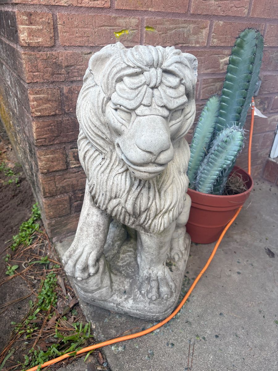 Two concrete lions