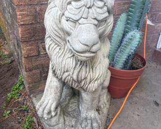 Two concrete lions