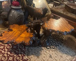Hand carved wood tables