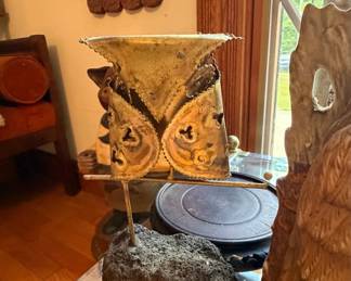 Vintage Metal Owl Sculpture on Volcanic Rock