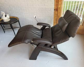 2 leather chairs powered by electricity.  $600.00 each