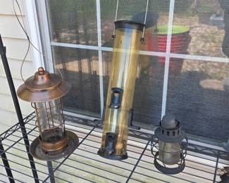 Assorted Bird Feeders and Decorative Lanterns