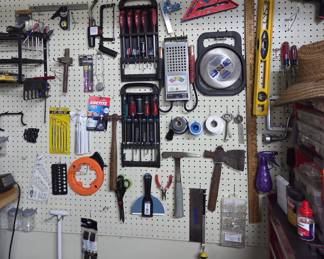 Assorted Hand and Power Tool Collection with Pegboard Display