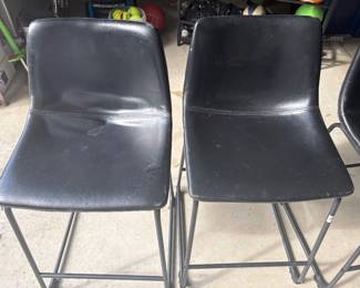 Black leather counter-height chairs - 4 available