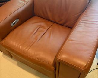 View of the armchair (45" W x 42" D) in Italian caramel leather - full recline with controls on the side
