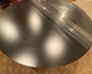 Another view of the top of the round dining table (plastic protective cover rolled back)