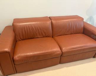 Caramel Italian Leather loveseat (86" W x 42" D) with full recline (64"D),  adjustable headrest - each side operates independantly    