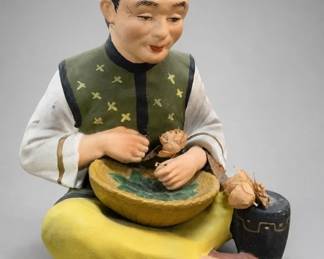 Japan-Marked Seated Ceramic Figurine