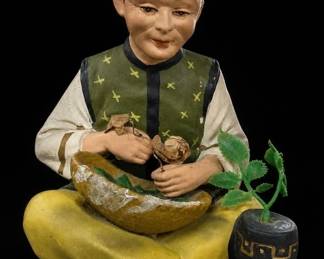 Seated Child Figurine