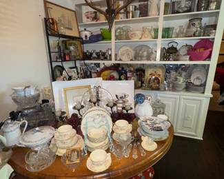 Fireplace screen, vintage tables, pictures, glassware, vintage records, lamp, vintage poker chips, cigar boxes, dining room table, Coca Cola glasses & trays, housewares, China, 20 piece cooking set, waffle maker, silverplate, sterling silver, platters, warming plates, tea cup & saucers, copper, butter dishes ,tea pots, coffee pots , glassware