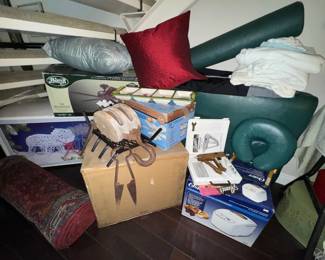 Massage table with attachments & Linens, bread machine NIB, Polar Bear lighted Christmas yard decor, ceiling fans NIB, pizza oven NIB, runner rug, accent pillows