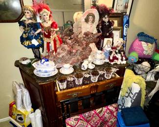 Marble chest of drawers/sideboard, soapstone horse sculpture, China, vintage glassware, mirror, tea cups, linens, comforters, sheets vintage dolls,