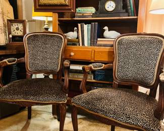 Pair of black leopard antique chairs