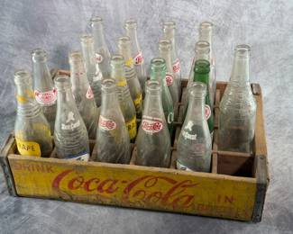 Yellow Coca-Cola Wood Crate with Vintage Soda Bottles