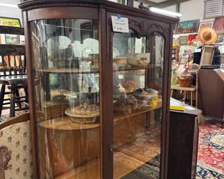 Curved glass curio