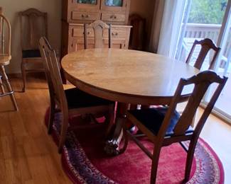 Antique Round Oak Pedestal Dining Table with carved claw feet