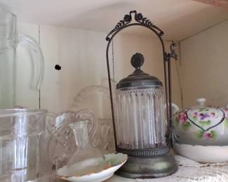 Victorian silver-plated pickle castor with a clear pressed-glass jar and matching tongs
