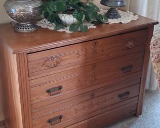 vintage Eastlake-style wooden chest of drawers