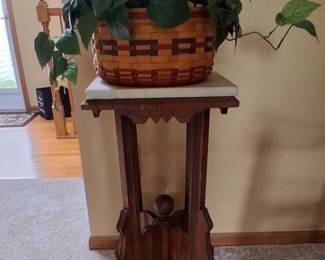 vintage or antique wooden plant stand or parlor table