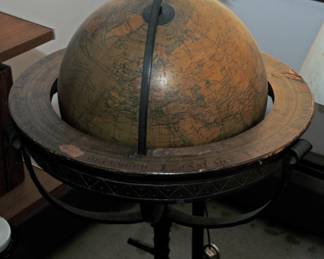 ANTIQUE GLOBE ON IRON STAND