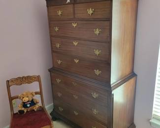 West Michigan Furniture Company 20th-century Colonial Revival Chippendale-style chest-on-chest.