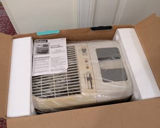 J39 - $50. Holmes Console Humidifier. 8 Gallon Output. Used in the box.