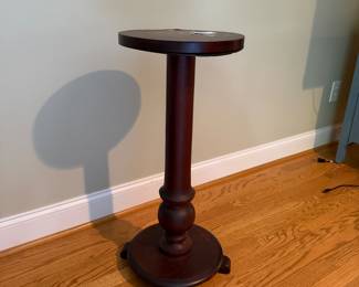 J146 - J146 - $35. Wooden Fern Stand. Measures 13" round x 30" tall. Top is a little warped.