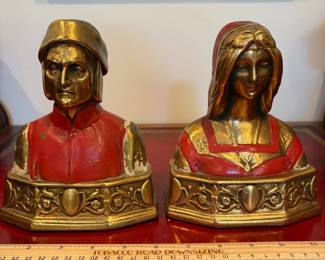J34 - $80. Vintage Dante & Beatrice Pompeian Solid Brass Bookends. Paint is chipping.